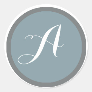 Monogramsymbol och kuvertförsegling runt klistermärke