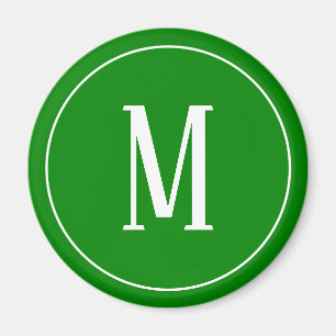 Monogramvit på den gröna rundamagneten magnet