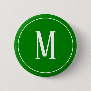 Monogramvit på grön runda knäppas knapp