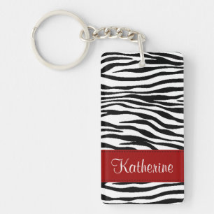 Monogramzebra ränder med den röda akrylen Keycha