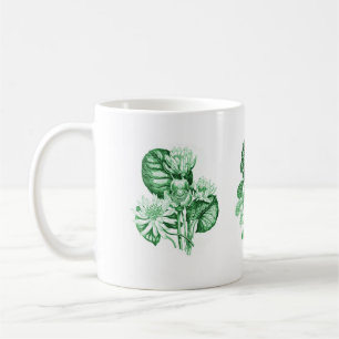 Monokroma blommor i grönt kaffemugg