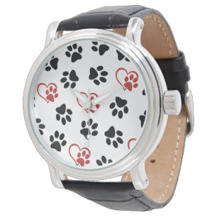 Mönster av tassar, svarta tassar, röda tassar, hjä armbandsur