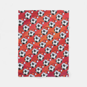 Mönster för boll för Santa hattfotboll på röt Fleecefilt