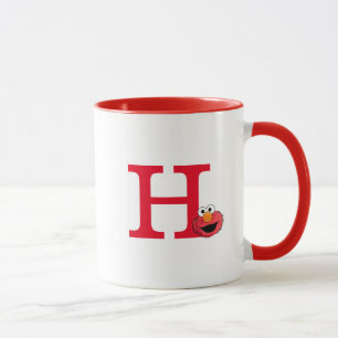 Monster i slutet av artikeln Elmo Monogram H Mugg