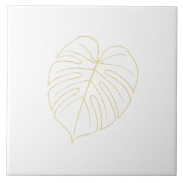 Monstera blad guld design. kakelplatta