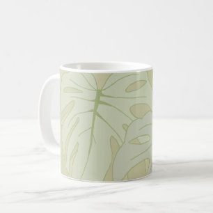 Monstera folie i mjuk grönt kaffemugg