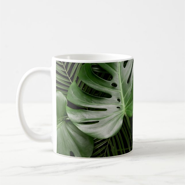 Monstera löv, lyxtropiskt utseende. kaffemugg (Vänster)