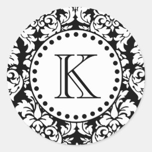 Mönstermonogram för svart vit mask runt klistermärke