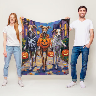 Mopsruttor som går runt på Halloween i utklädnad Fleecefilt