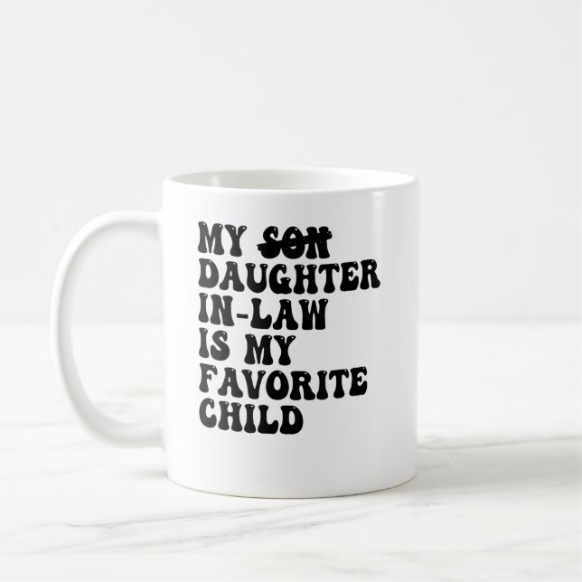 Mor-i-juridik-familjens matchande dotter finns kaffemugg (Vänster)