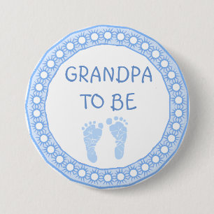 Morfadern som är blåttpojkebaby shower, knäppas knapp