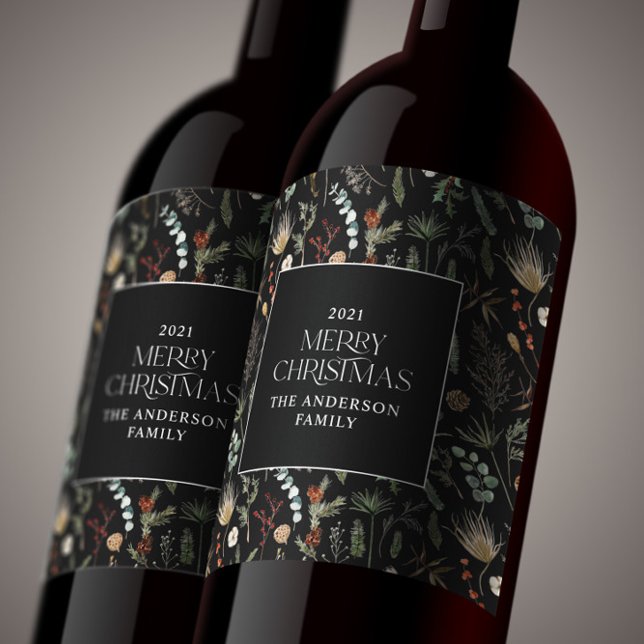Mörk av botanisk blommigt i julvatten moody med vinflaska etikett (Skapare uppladdad)