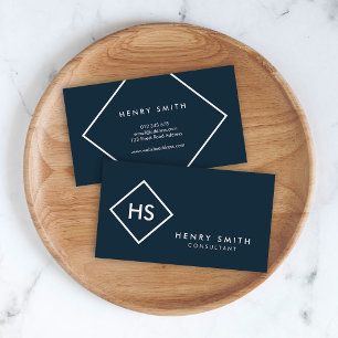 Mörk blått och vitt minimalistiskt monogram visitkort