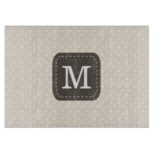 Mörk Brown Monogram på Beige-bakgrunden