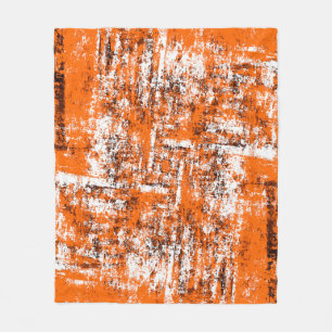 Mörk brun grym bakgrund. Svartvit orange o Fleecefilt