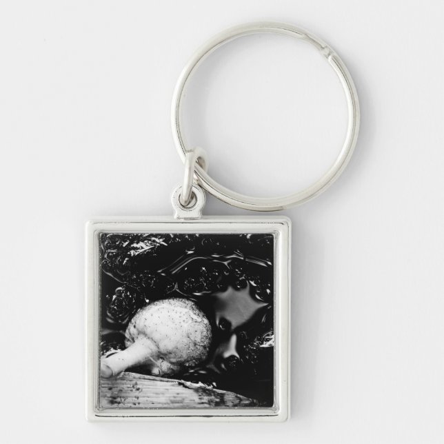 mörk fyrkantig silverfärgad nyckelring (Framsidan)