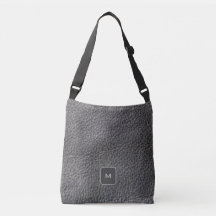 Mörk grått svart läderfotoavtryck i monogrammet