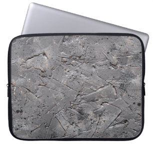 Mörk, grov texturerad bakgrund, krackad stenvägg laptop fodral