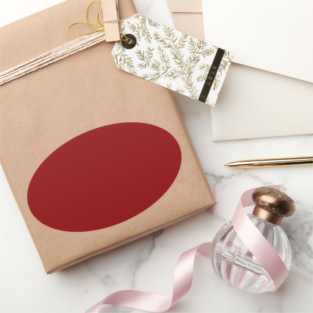 mörkröd ovalt klistermärke (Gifting)