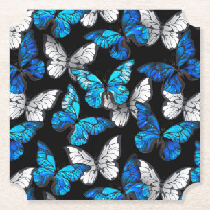 Mörkt sömlöst mönster med blå fjärilar Morpho Underlägg Papper