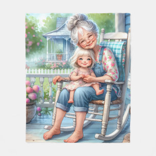 Mormor och barnbarn omfamnar varandra på verandan fleecefilt
