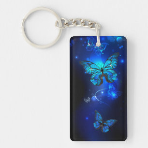Morpho Butterfly i Mörkens bakgrund Nyckelring