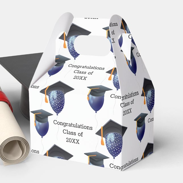 Mortarboard och ballonger i studenten presentaskar (Skapare uppladdad)