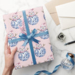 Mortusenårshjul, Snögubbe Presentpapper<br><div class="desc">Den här julklappen har en snögubbe med en blå damm på  rosa.</div>