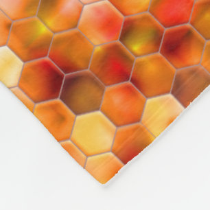 Mosaik av hexagoner på prickar i rödfärgade toner fleecefilt