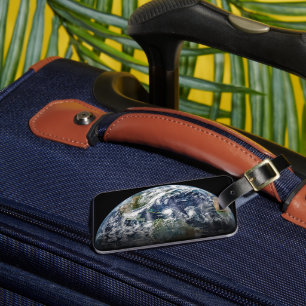Mosaik-bild av planeten jord med 3 orkaner bagagebricka