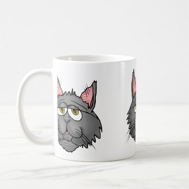 Moses the Qat Mugg (Vänster)
