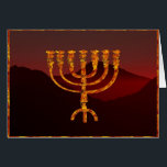 Moshe's Menora Hälsningskort<br><div class="desc">I Torah Moshe Rabbenu sägs: "Du ska göra en Menorah av rent guld, som blir slagen, ska Menorah vara gjord, dess bas, dess gren, dess gåbletter, dess knoppar, och dess blommor ska härledas från den, " [Shmot 25:31] och senare, "Se och konstruera, enligt den form som du visas på berget."...</div>