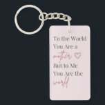 Mother’s Day Keychain<br><div class="desc">Celebrate the love of motherhood with this elegant Mother’s Day keychain featuring the heartfelt quote: “To the world you are a mother, but to me you are the world.” This minimalist typography design combines classic serif lettering with a graceful script font, creating a timeless and meaningful gift for mom. The...</div>