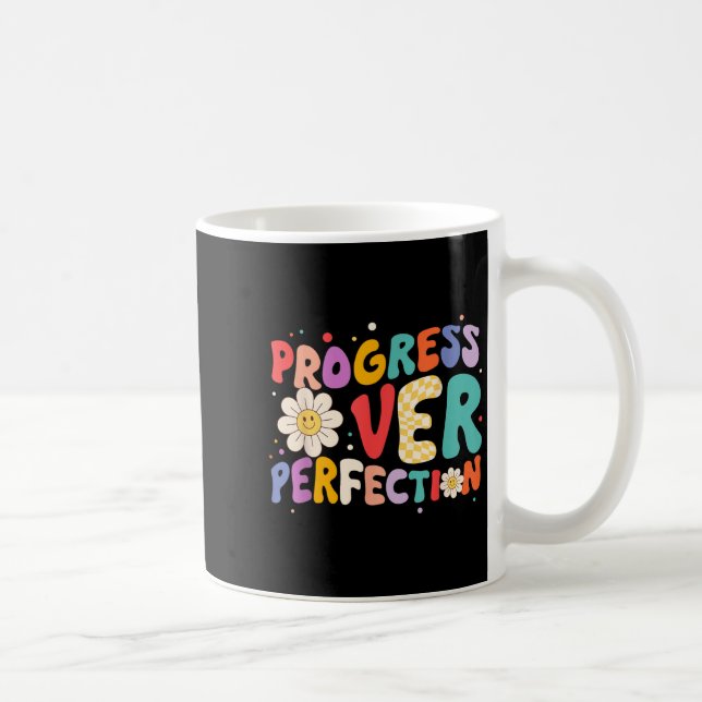 Motiverande framsteg jämfört med prefektionsläkare kaffemugg (Höger)