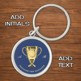 Motiveringsutbildning för framgångsrikt monogram rund silverfärgad nyckelring