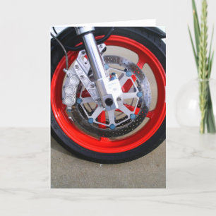Motorcykelmotorcykeln rullar det röda kantfotoet kort