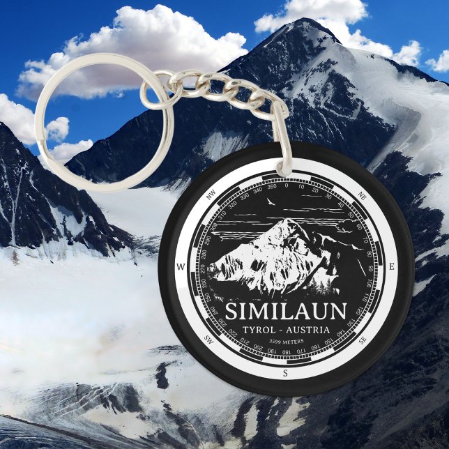 Mount Likaun - Tyrol Austria Alpernas (Mount Similaun Keychain in Back with a white compass and mountain illustration)