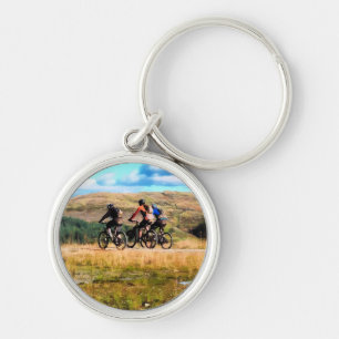 MOUNTAIN BIKING RUND SILVERFÄRGAD NYCKELRING