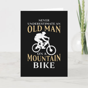 Mountainbikepresent till gammal manlig cyklist kort