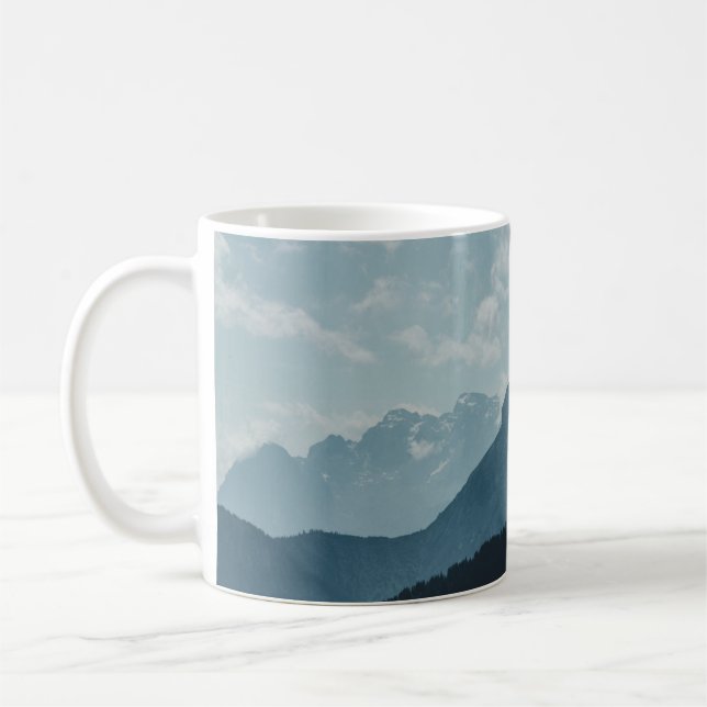 MOUNTAINER UNDER VITE HIMLAR KAFFEMUGG (Vänster)