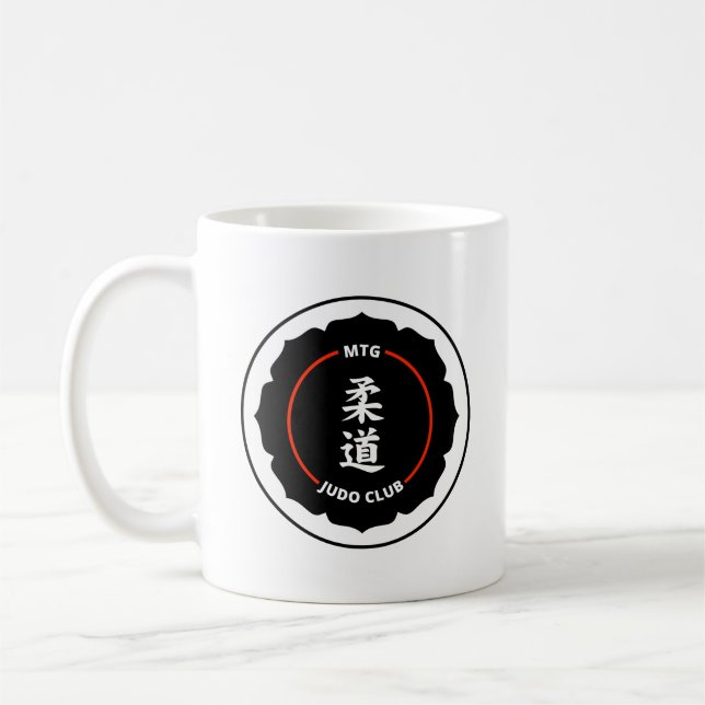 MTG-Judoklubben planerar logotypmuggen Kaffemugg (Vänster)
