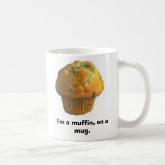 muffin I-förmiddag en muffin, på en mug. Kaffemugg