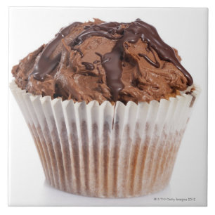 Muffin med chokladisläggning kakelplatta