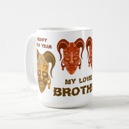 MUG MED TARDITIONELL MASKKONST KAFFEMUGG