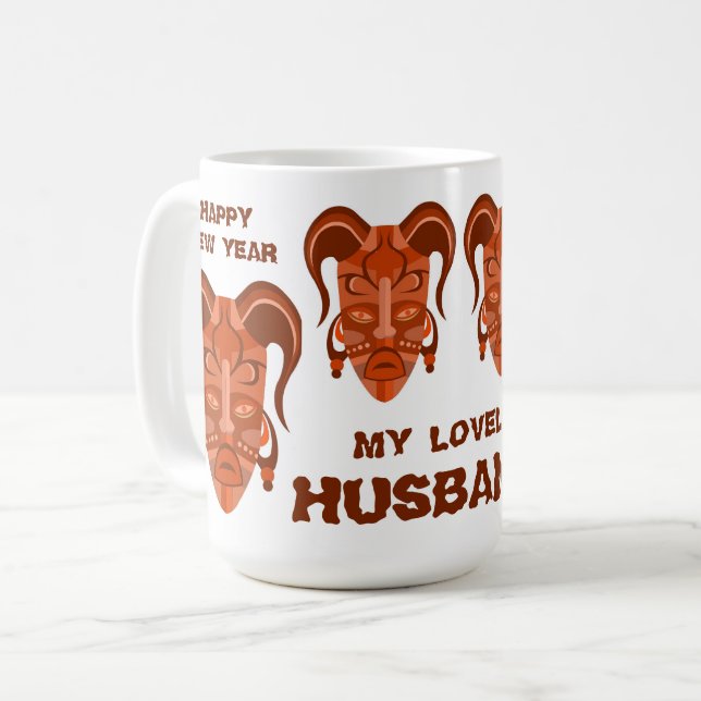 MUG MED TREDITIONELL MASKKONST KAFFEMUGG (Framsida vänster)