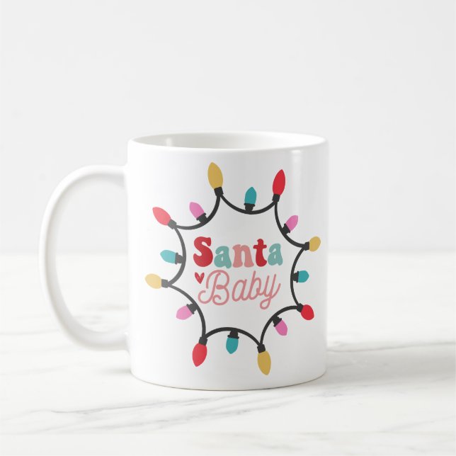 Mugg av lätt kaffe av baby jul (Vänster)