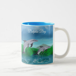 Mugg för kaffe för delfinfjärd tropisk vid Yoti