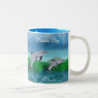 Mugg för kaffe för delfinfjärd tropisk vid Yotigo
