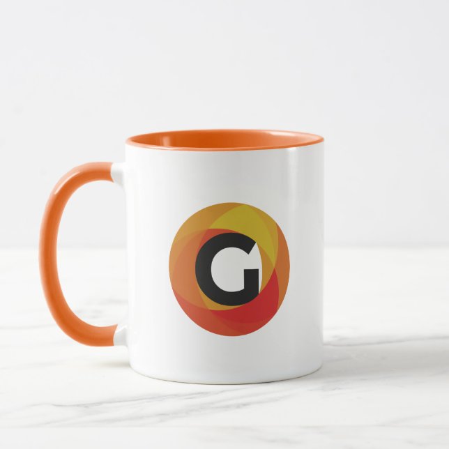 Mugg för kaffe för Guido massmedia orange (Vänster)