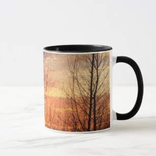 mugg för vintersolnedgångkaffe